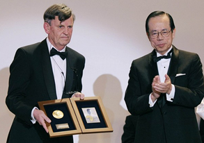 Professor Greenwood shows the award after receiving it from the Japanese Prime Minster H. E Yasuo Fukuda