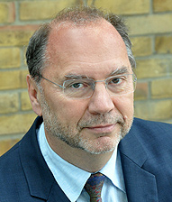 Dr. Alex Godwin COUTINHO Dr. Peter PIOT