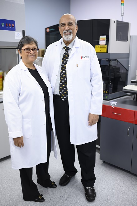 Professors Salim and Quarraisha Abdool Karim in the CAPRISA main laboratory